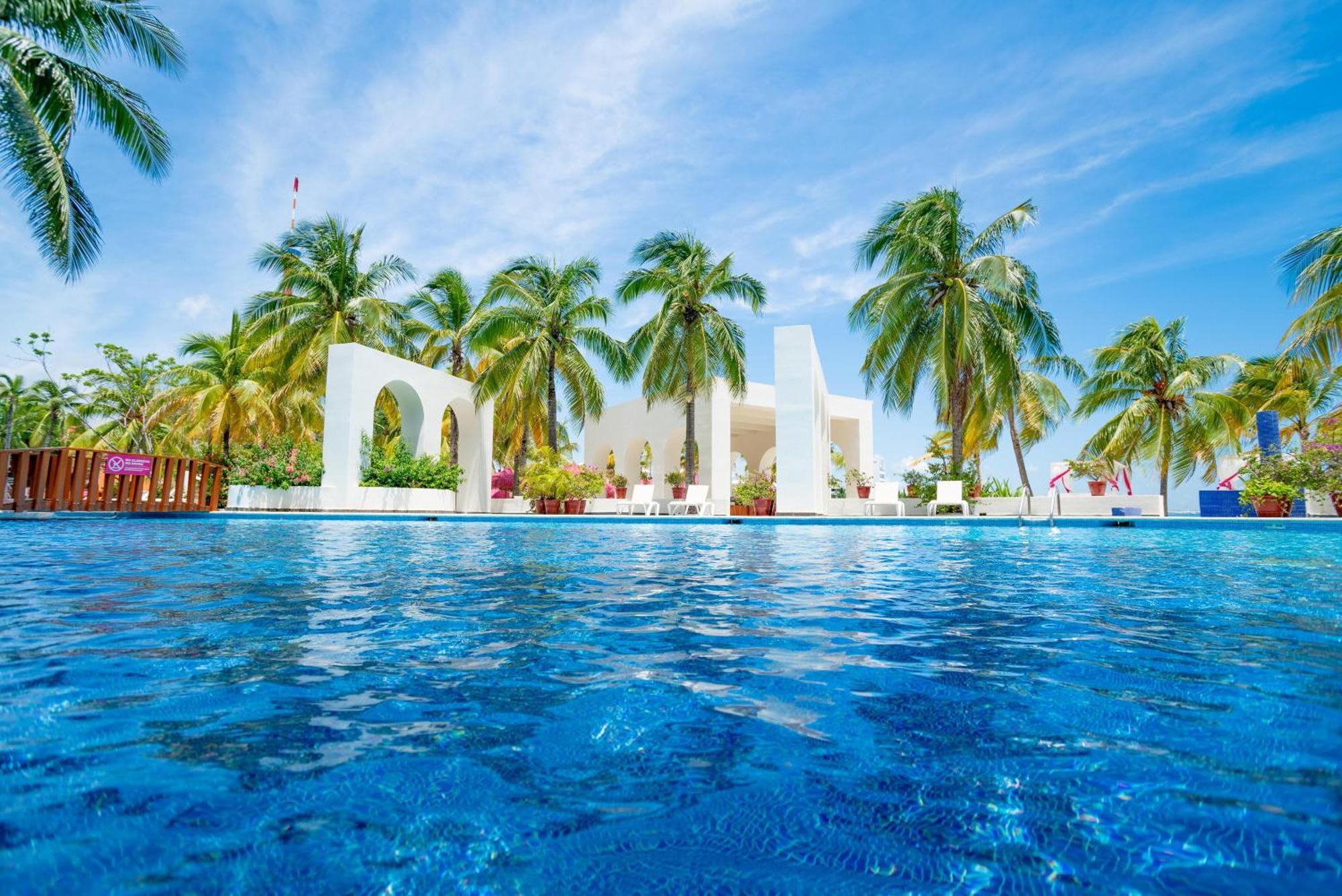 Отель Grand Oasis Palm Канкун Экстерьер фото The pool at the Hard Rock Hotel