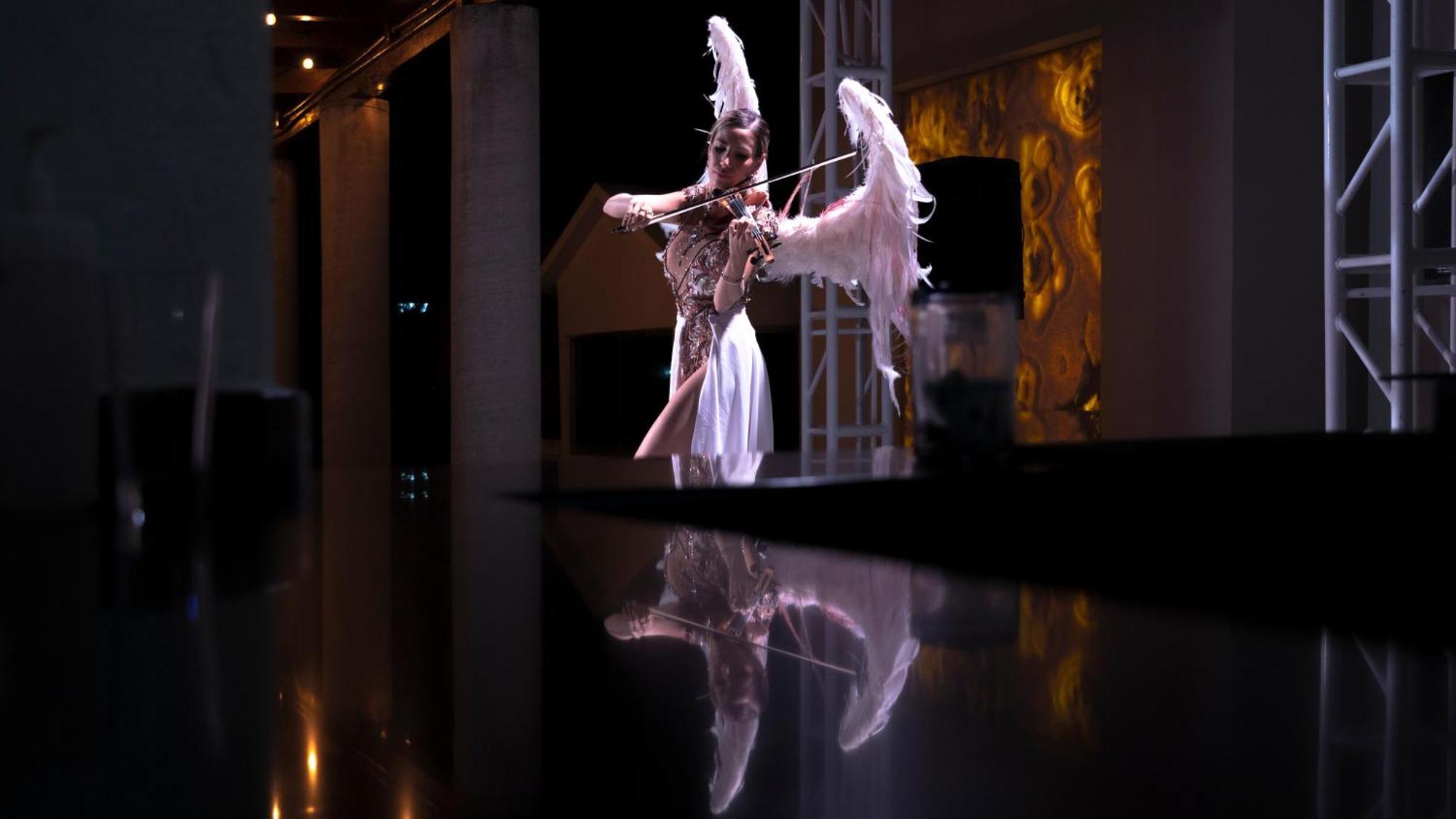 Отель Grand Oasis Palm Канкун Экстерьер фото A hologram of a violinist