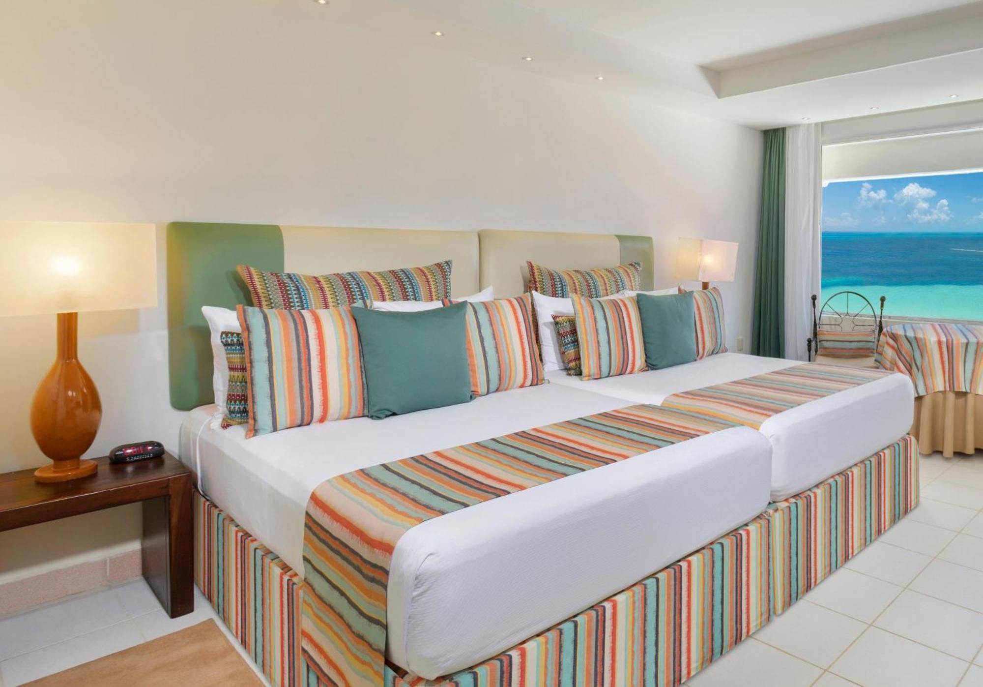 Отель Grand Oasis Palm Канкун Экстерьер фото A bedroom at the Iberostar Grand Hotel Bávaro