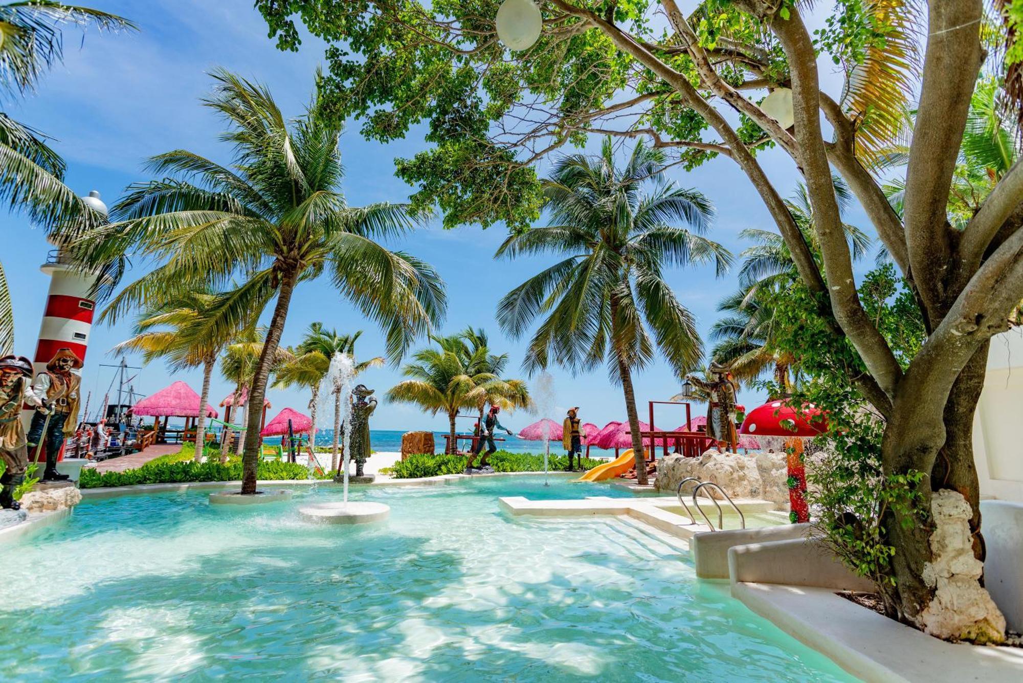 Отель Grand Oasis Palm Канкун Экстерьер фото The beach at the resort
